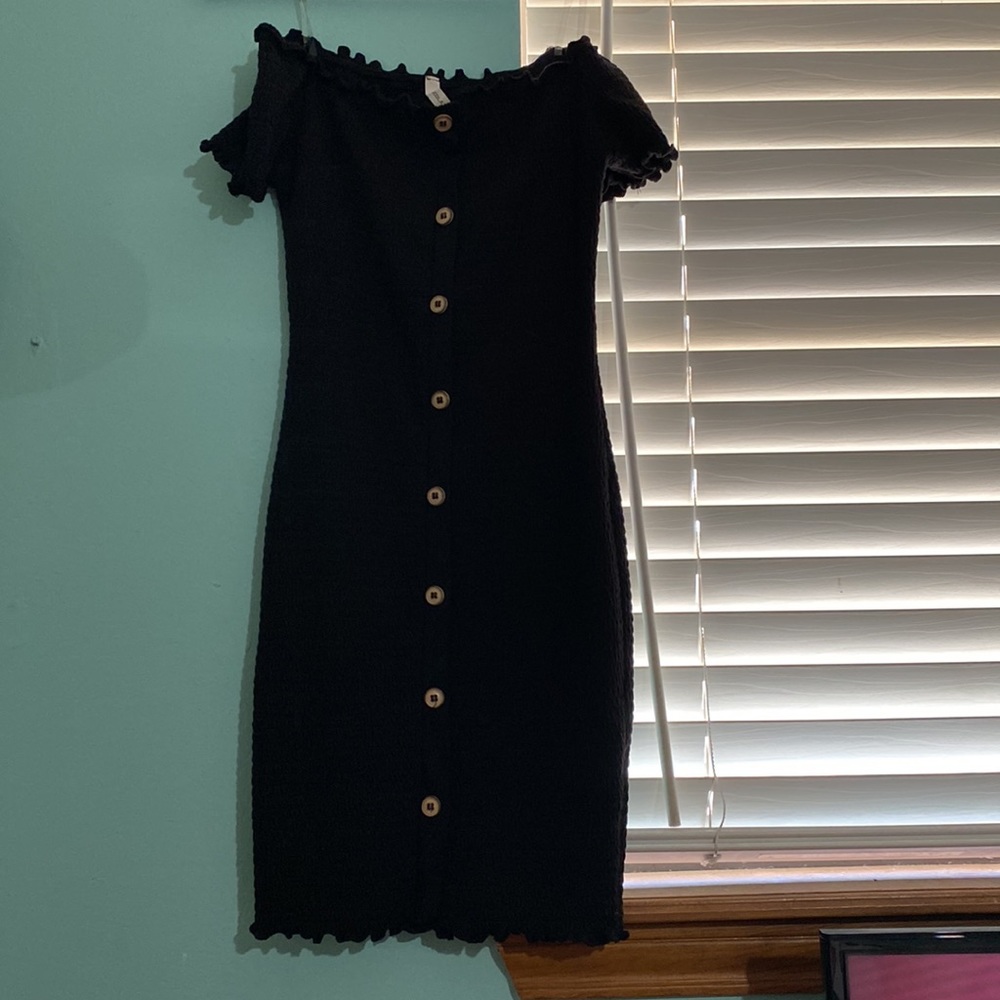 Black off the shoulder mini dress with a button down look